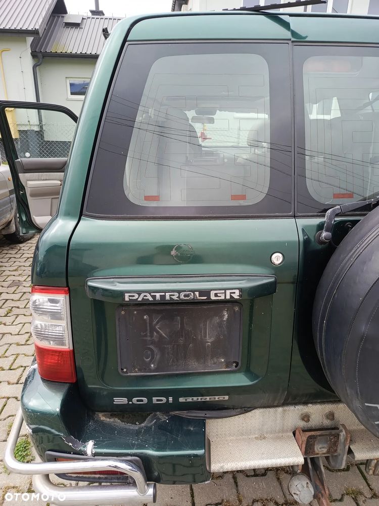 NISSAN PATROL 5D KLAPA BAGAŻNIKA Z SZYBĄ LEWA TYŁ TYLNA GOŁA DW0
