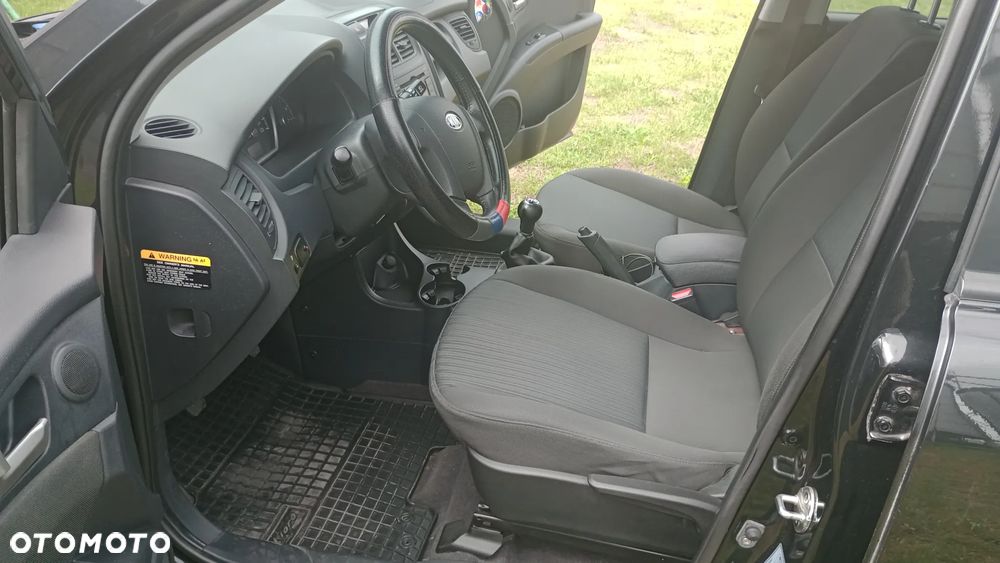 Kia Sportage 2.0 Tour - 1
