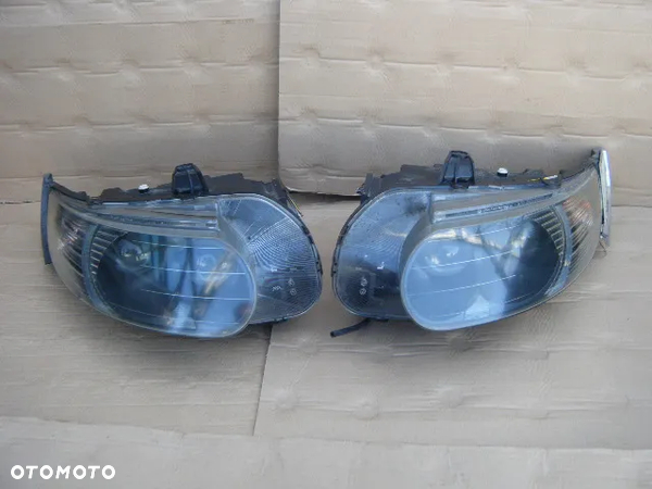 lampy przednie xenon saab 95 9-5 07r przod LEWA PRAWA =europa eu