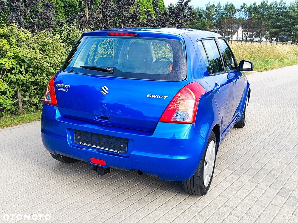 Suzuki Swift 1.3 Club - 4