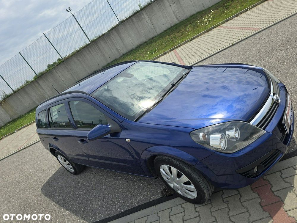 Opel Astra 1.8 Caravan Edition - 19