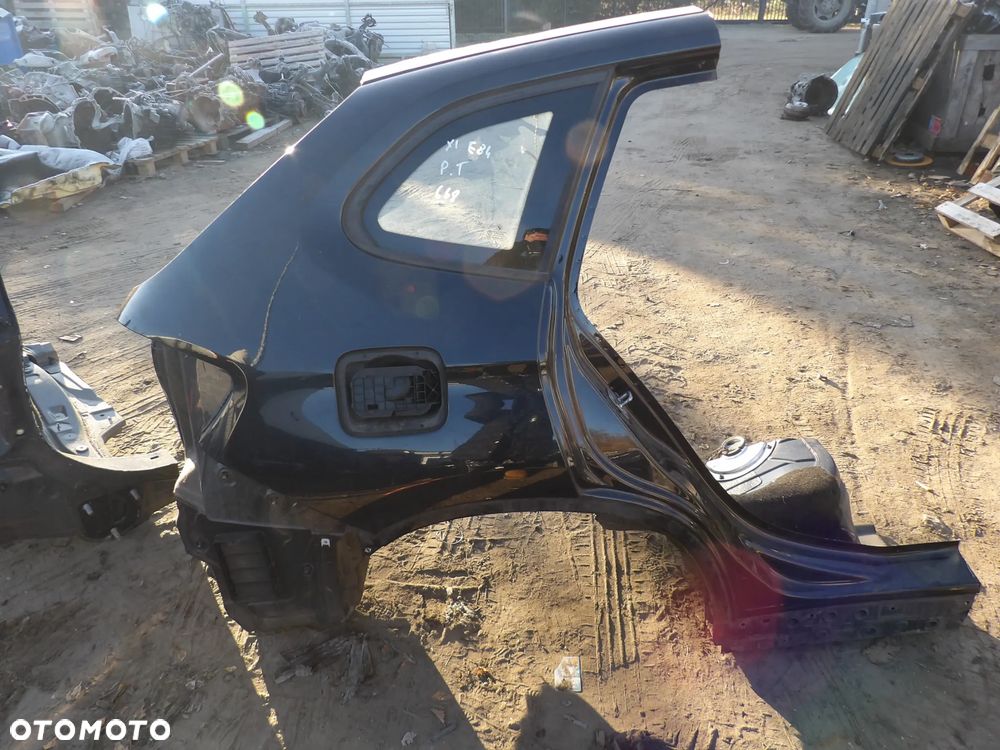 BMW - E84,X1 - KOLOR 668 - POSZYCIE BŁOTNIKA - PRAWY TYŁ - 1