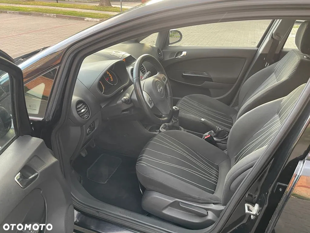 Opel Corsa 1.2 16V Enjoy - 11