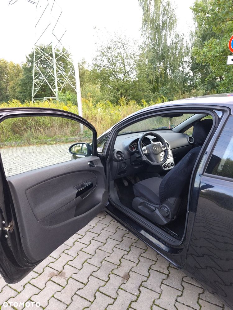 Opel Corsa 1.4 16V Enjoy - 11