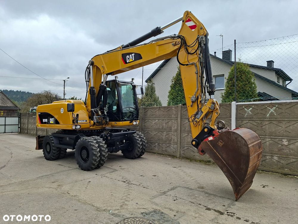 Caterpillar CAT M 318 D - 12