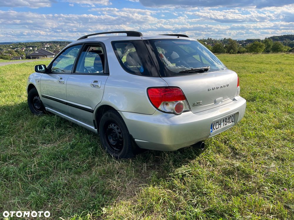 Subaru Impreza SW 1.6 TS 4x4 - 6