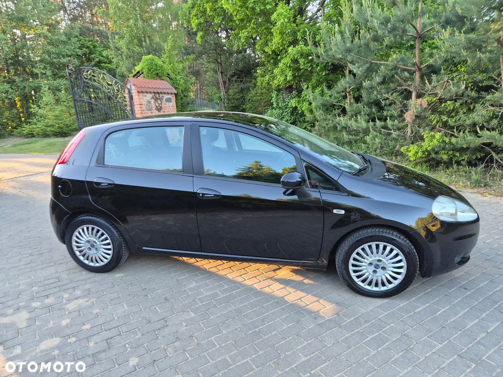 Fiat Grande Punto 1.4T-Jet Emotion - 26