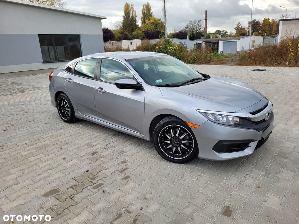 Honda Civic 2.0 i-VTEC LX CVT - 1