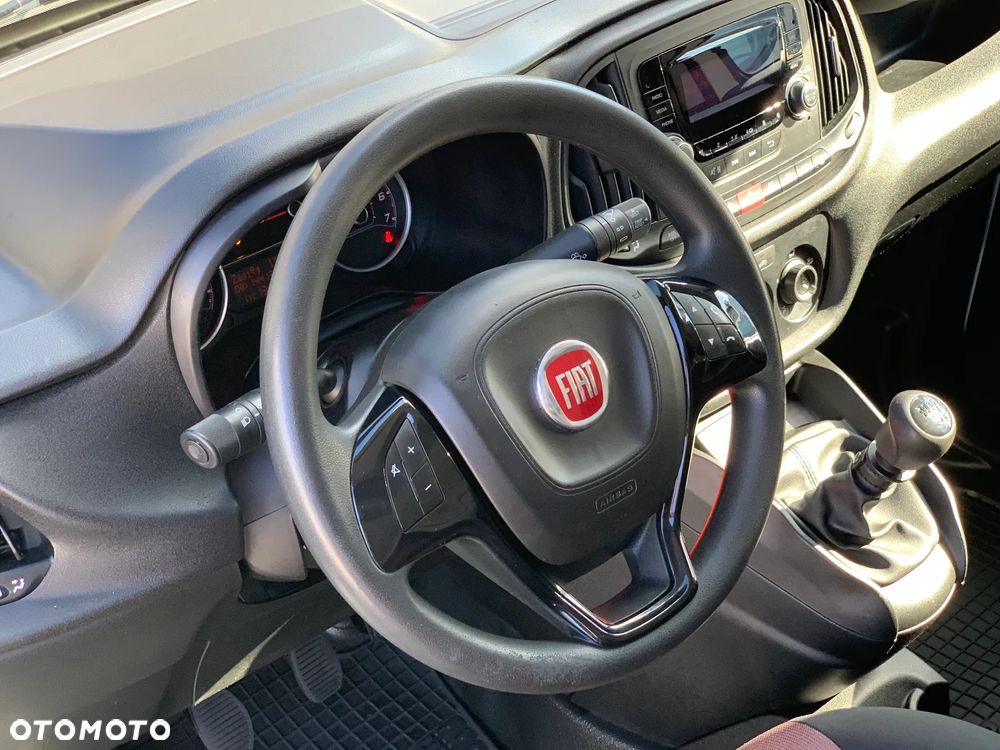 Fiat DOBLO PROFESSIONAL L2H1 Long MAXI VAN WZMOCNIONY Ładowność 961kg, Homologacja cięż. VAT-1, HAK wpinany 1300kg, Alarm, Czujniki parkowania, Halogeny, Podgrzewane fotele, Koła 16' MOCNY SILNIK 1.6 MultiJet, 105KM Emisja spalin Euro-6, Skrzynia biegów 6cio stopniowa! Zabudowa paki, F-VAT23% - 23