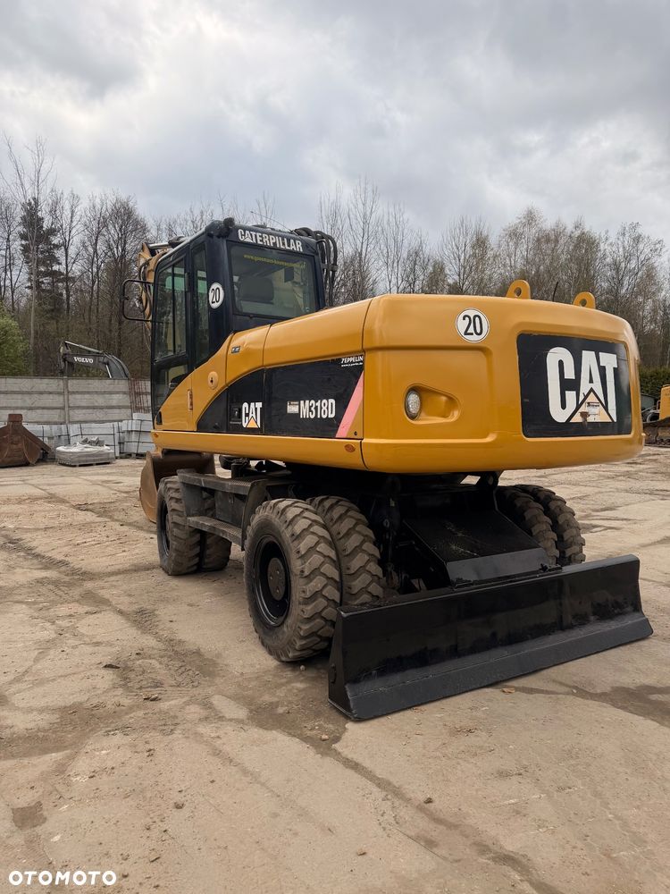 Caterpillar M318d - 1