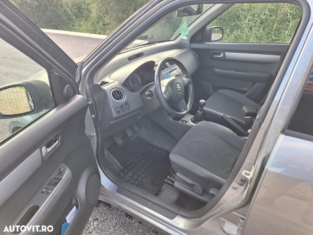 Suzuki Swift 1.3 DDiS Comfort - 9