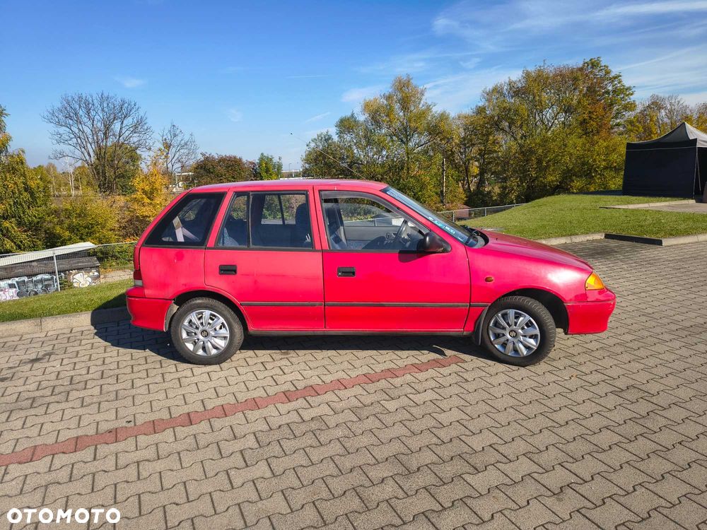 Suzuki Swift 2003 photo 2
