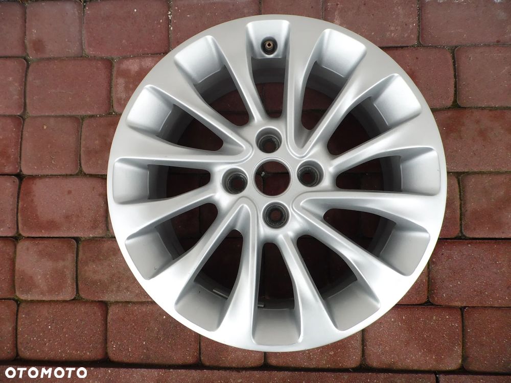 Felga 16'' 4x100 Opel 6,5Jx16H2 ET40 TPMS 13399305 - 1