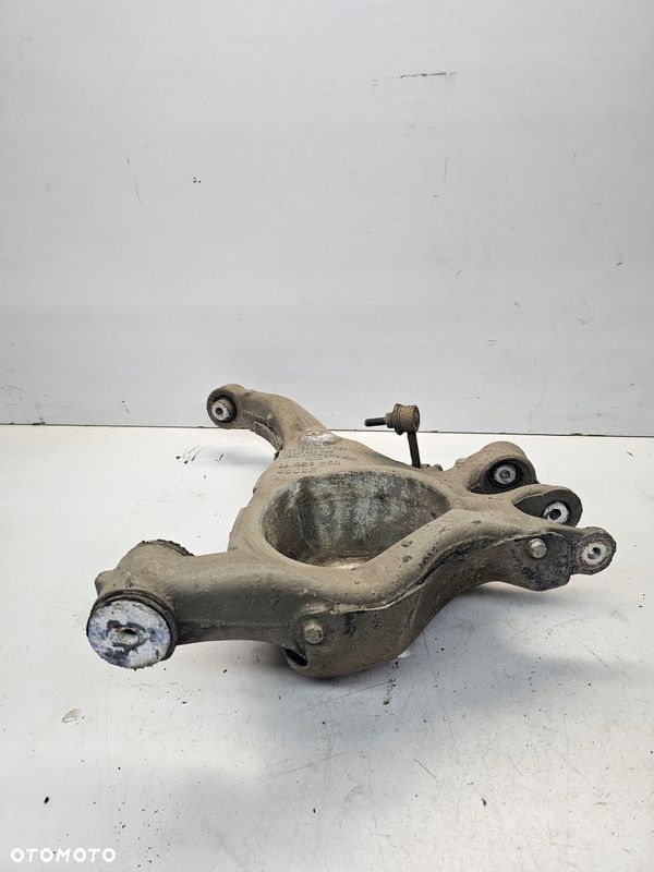 WAHACZ LEWY TYŁ POD PNEUMATYKĘ AUDI A6 C6 4F0505311L - 2