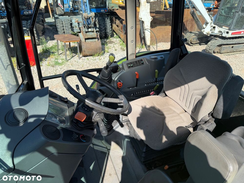 Claas Axos 320 - 16