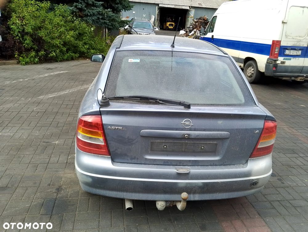 Opel Astra G (04r.) 2.0 HDI 89KM. Silnik Z14XE Skrzynia MG4 lakier 163 / 4AU / GBJ - SILVER LIGHTNING.Cały na części. GWARANCJA !!!  Przód Tył Zestaw Komplet Drzwi Klapa Zderzak Błotnik Maska Grill Atrapa Szyba Pas Lampa Lusterko Boczki Fotel Kanapa Kokpit Deska Rozdzielcza Przełącznik Włącznik Sterownik Przewody Wiązka Instalacja Moduł Komputer Czujnik Listwa Pompa Alternator Wtryski Głowica Rozrusznik Kompresor Sprzęgło Dwumas Silnik Skrzynia ABS Klimatyzacji Paliwa Wspomagania Kolektor Turbina Przepustnica Zawór Chłodnica Koło Hak Belka Sanki Zawieszenie Mcpherson Półoś Amortyzator Wydech Tłumik Zacisk Most - 6