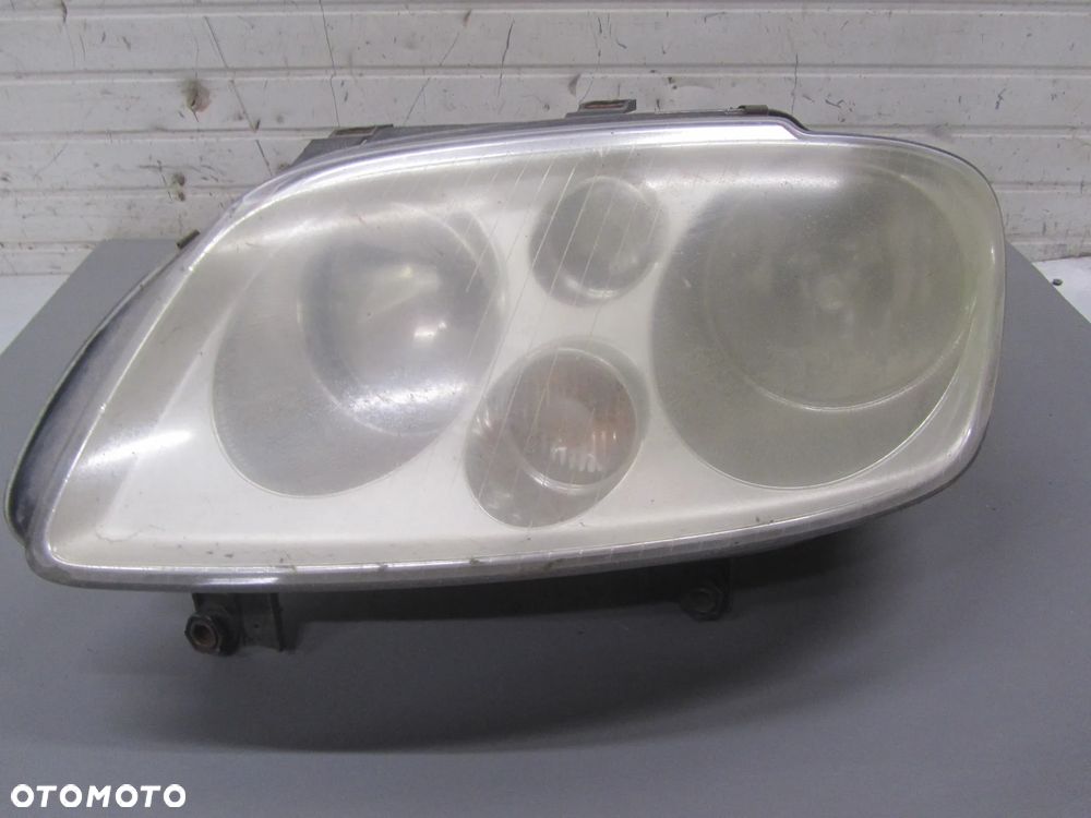 Reflektor Lewy Przód UK Volkswagen Caddy 2003- - 1