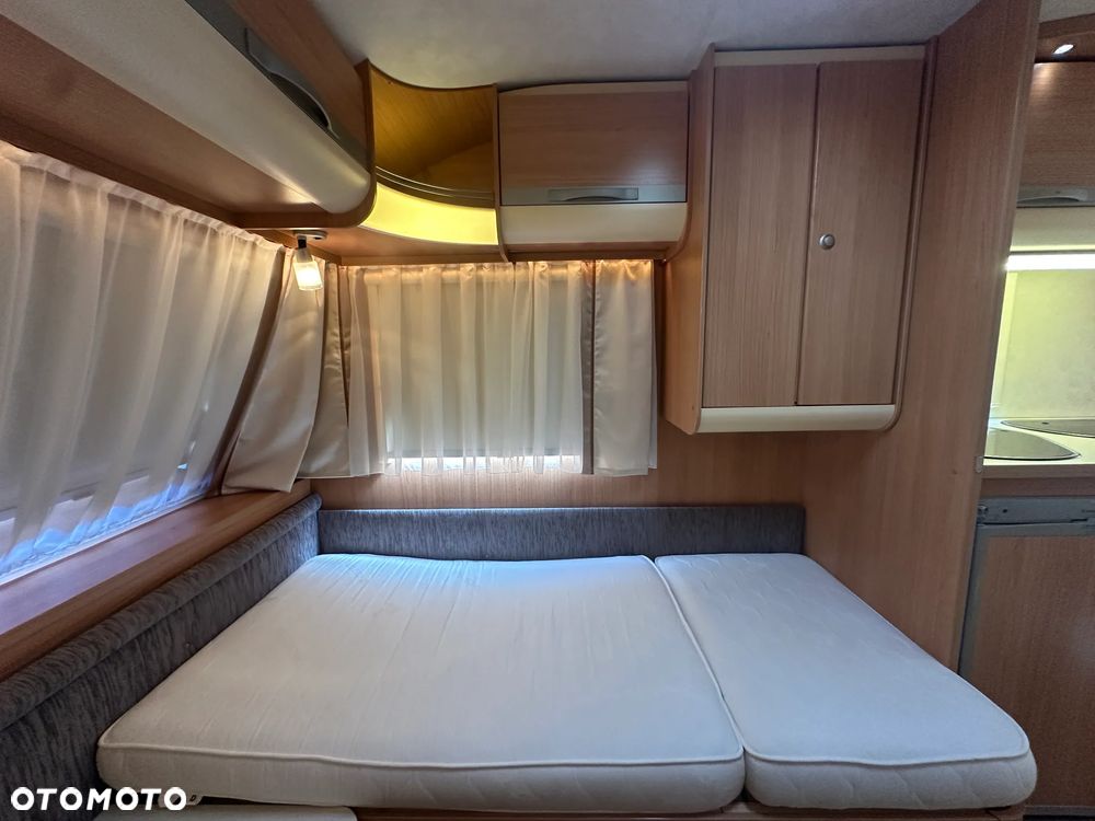 Adria ADORA 472 LU z napędem i markizą ze ścianami.  DMC 1300 - 35