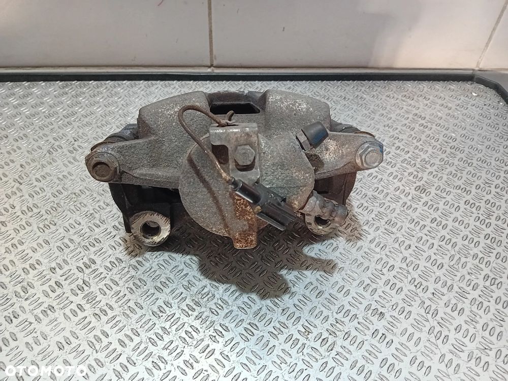 zacisk hamulca prawy tył Fiat Ducato III 2021 Y04076A - 2