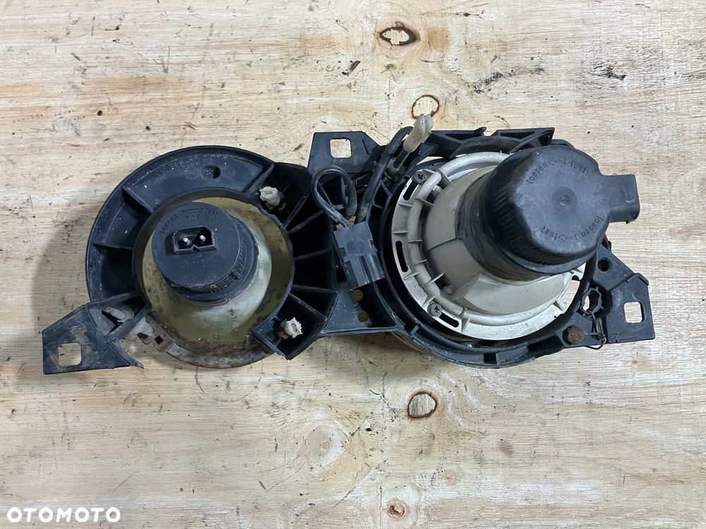 LAMPA BMW E30 HELLA PRAWA UŚMIECH REFLEKTOR E32 E34 - 5
