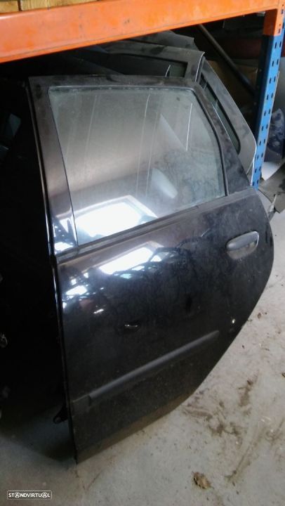 Porta completa traseira lado condutor mitsubishi cot c30 - 1