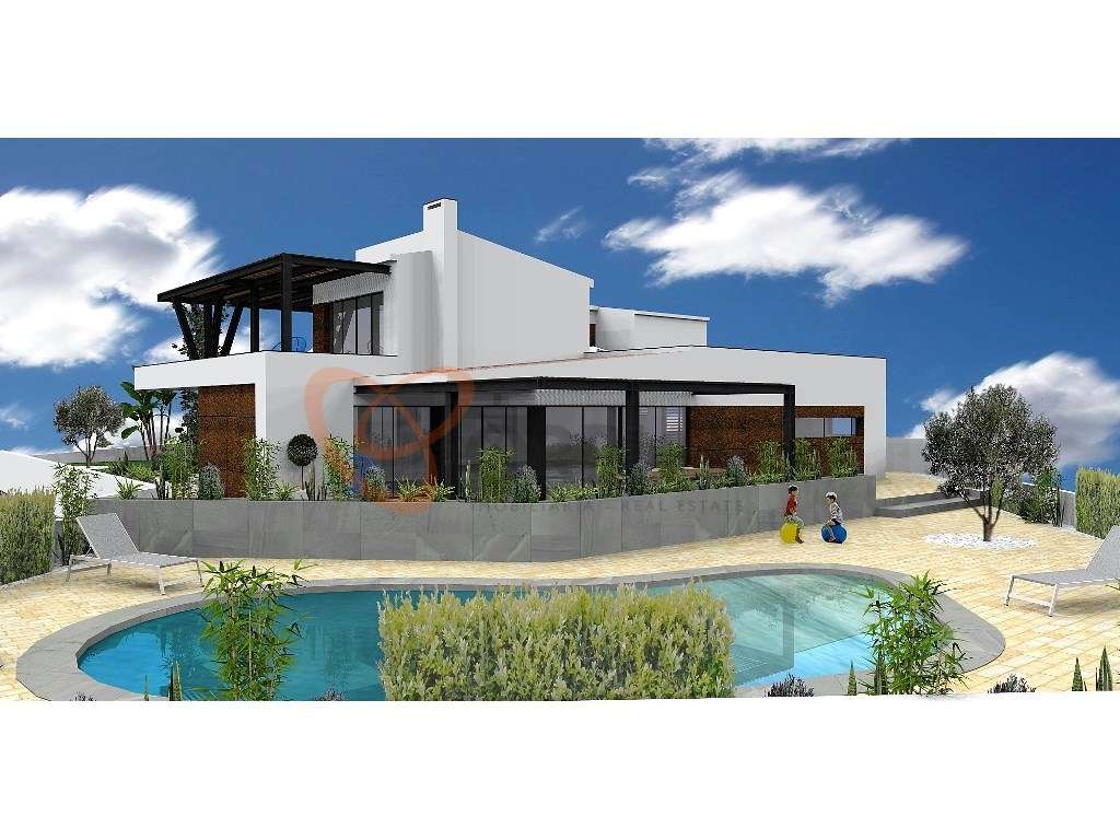 Moradia V4 com piscina e perto da praia para venda em Albufeira. - Grande imagem: 2/38