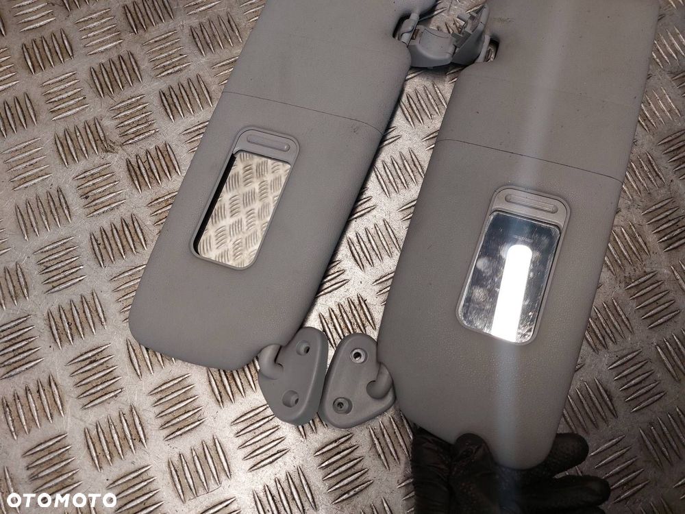 OSŁONA PRZECIWSŁONECZNA LEWA +  PRAWA BMW E87 118d - 2