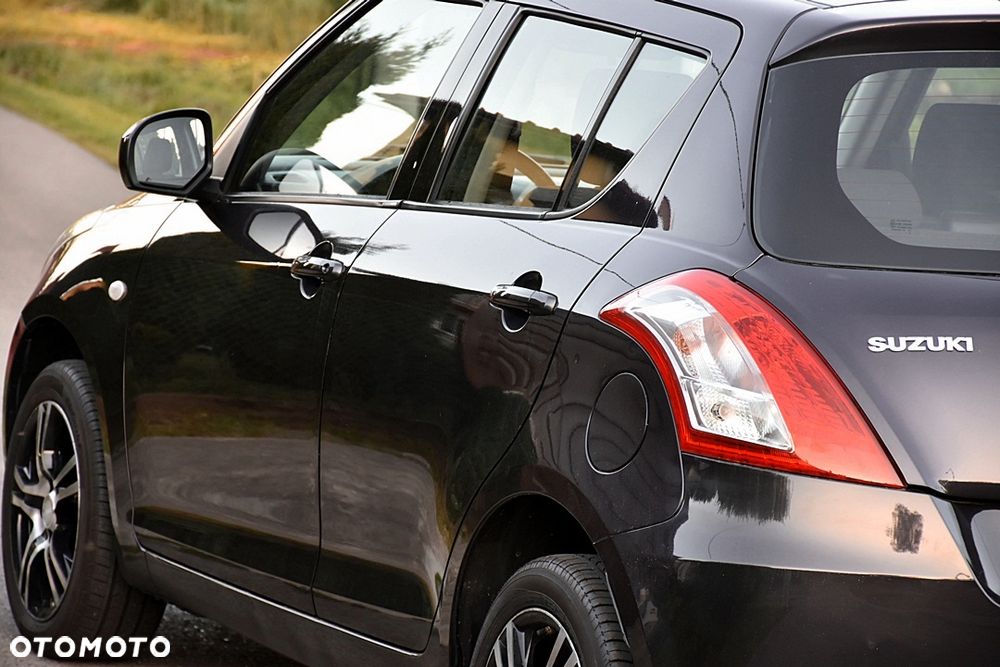 Suzuki Swift 1.2 4x4 Club - 12