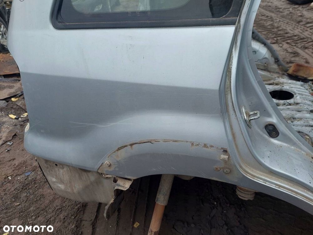 ĆWIARTKA BŁOTNIK PRAWY TYŁ TOYOTA RAV4 II 5D 1D4 - 2