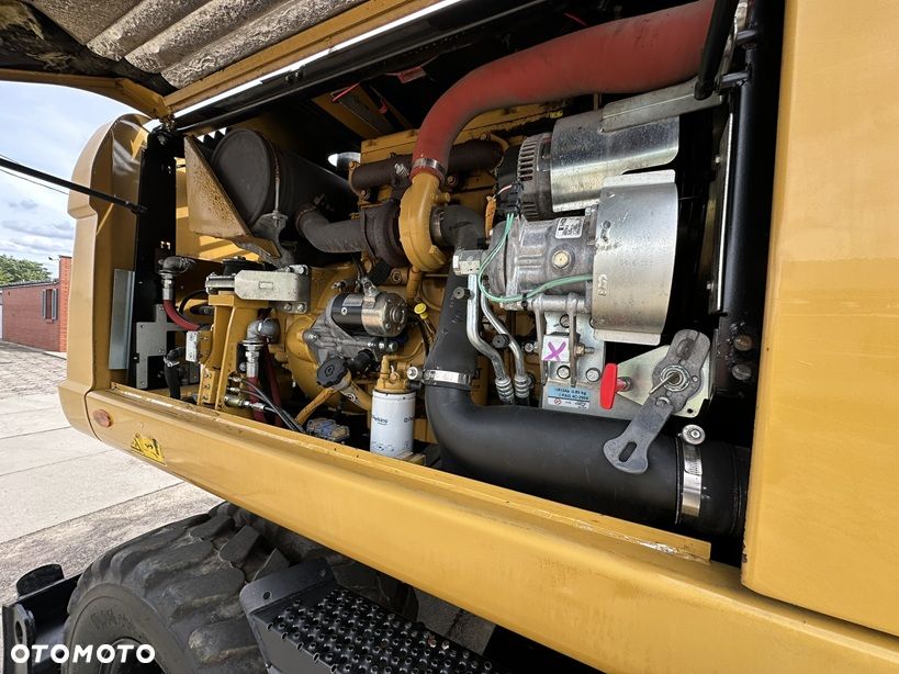 Caterpillar M313D * Podnoszona Kabina * A2-BUD * - 36