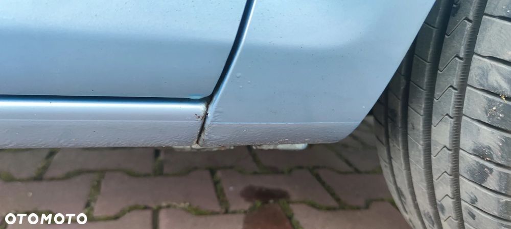 Opel Corsa 1.4 16V Cosmo - 14