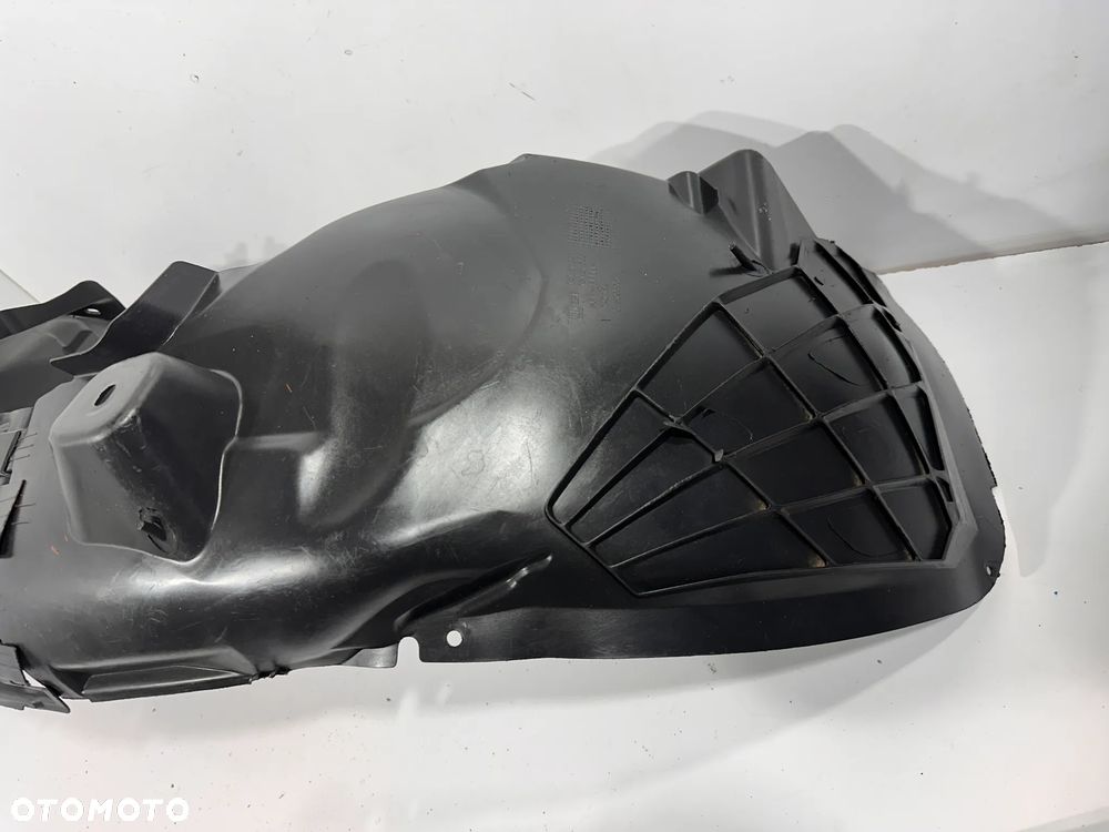 Nadkole przód L  Opel Corsa D  513765057 - 2