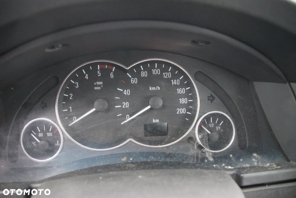 Auto na części - Opel Meriva A 1.7 CDTI 101 KM Z17DTH F23 4AU 2004R Silnik Skrzynia Drzwi Maska Zderzak Błotnik Klapa Lampa Lusterko Klamka Szyba Deska Kokpit Sterownik Moduł Czujnik Licznik Wyświetlacz Panel Kierownica - 11