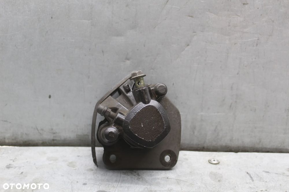 Suzuki TUX 125 TU X Zacisk hamulcowy - 1