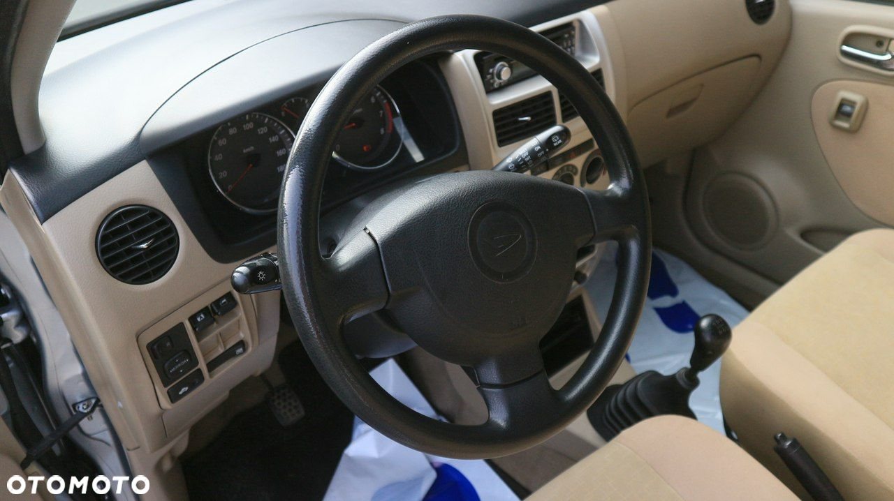 Daihatsu Cuore 1.0 Top - 10
