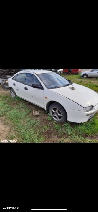 Dezmembrez Mazda 323 - 2