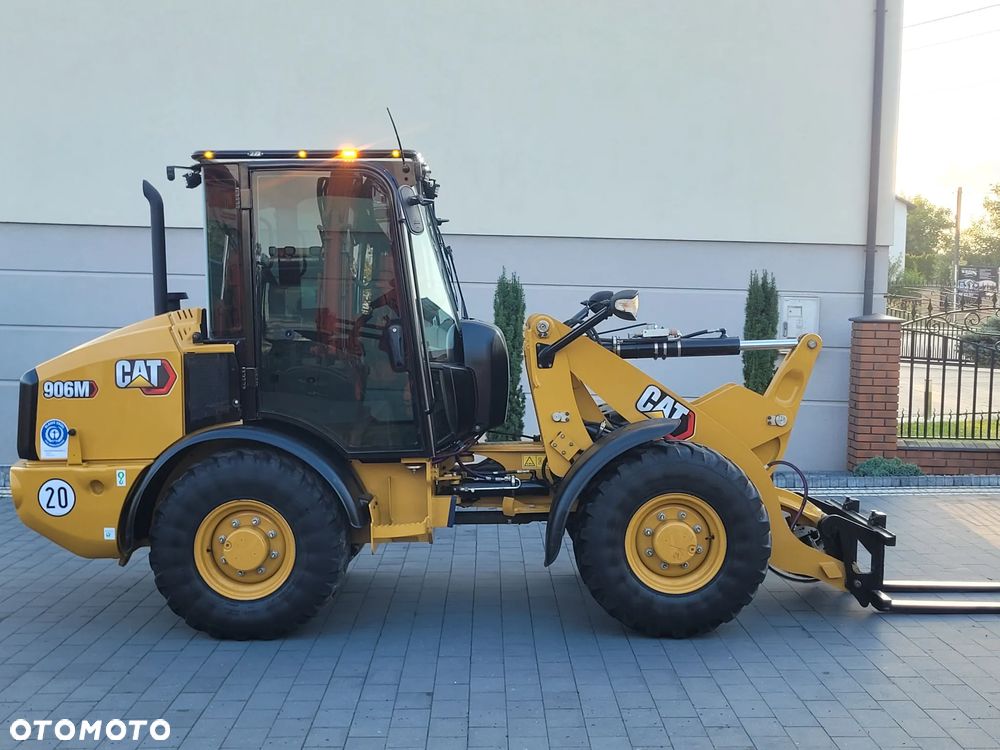 Caterpillar 906M / widły + łyżka otwierana / model 2022 r. / STAN IDEALNY / - 1