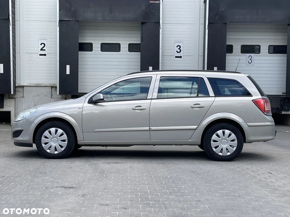 Opel Astra 1.8 Caravan - 13