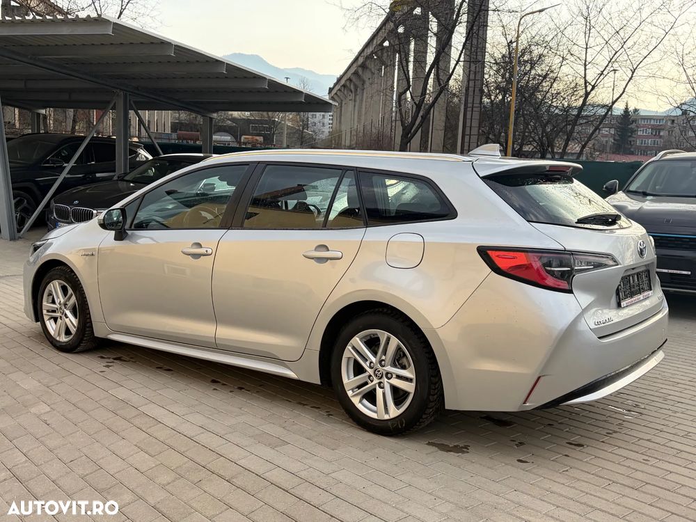 Toyota Corolla 1.8 HSD Business - 11