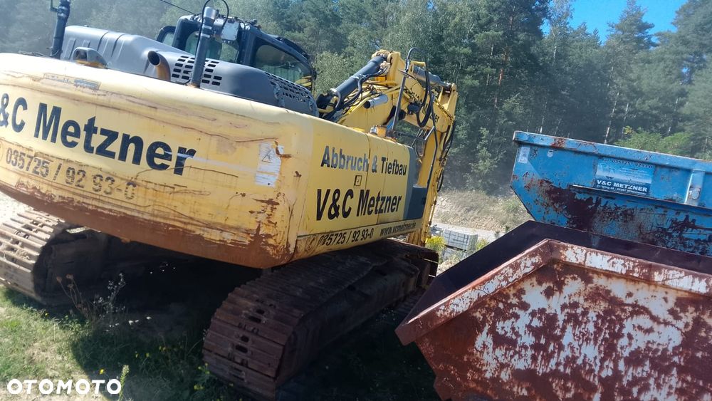 New Holland e265 - 2