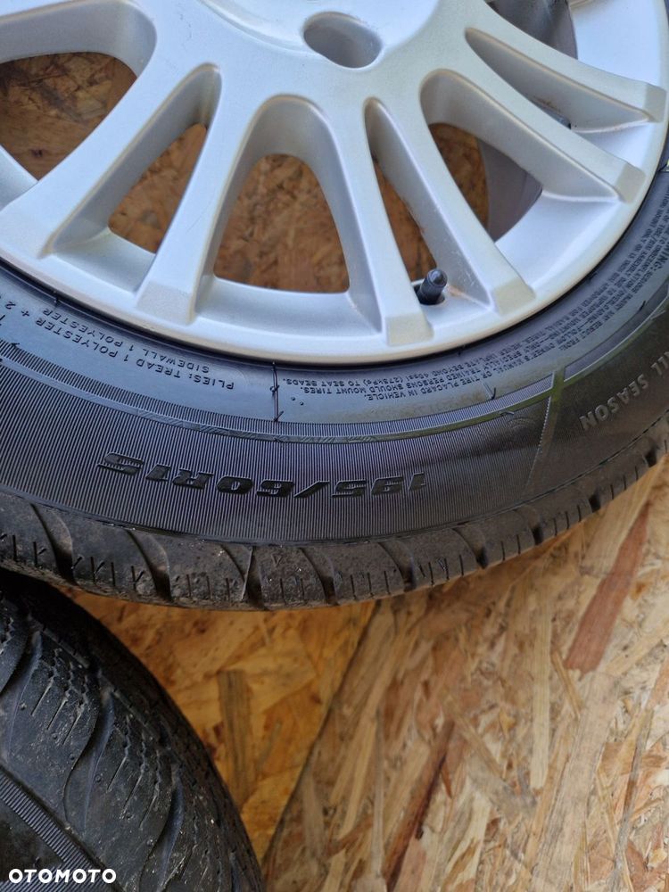 VOLVO FELGI ALUMINIOWE ET44 6Jx15 4X108 OPONY CATCHFORS 195/60 R15 7 mm - 8