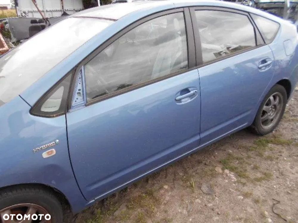 TOYOTA PRIUS 03-09 ZAMEK DRZWI LEWY PRZÓD EU - 1