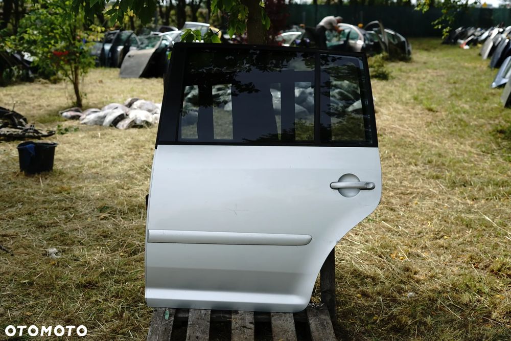 Drzwi tył tylne lewe VW Touran I Lift LA7W