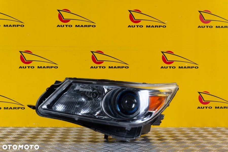 BUICK LACROSSE 2009- REFLEKTOR LAMPA XENON LEWA USA - 2