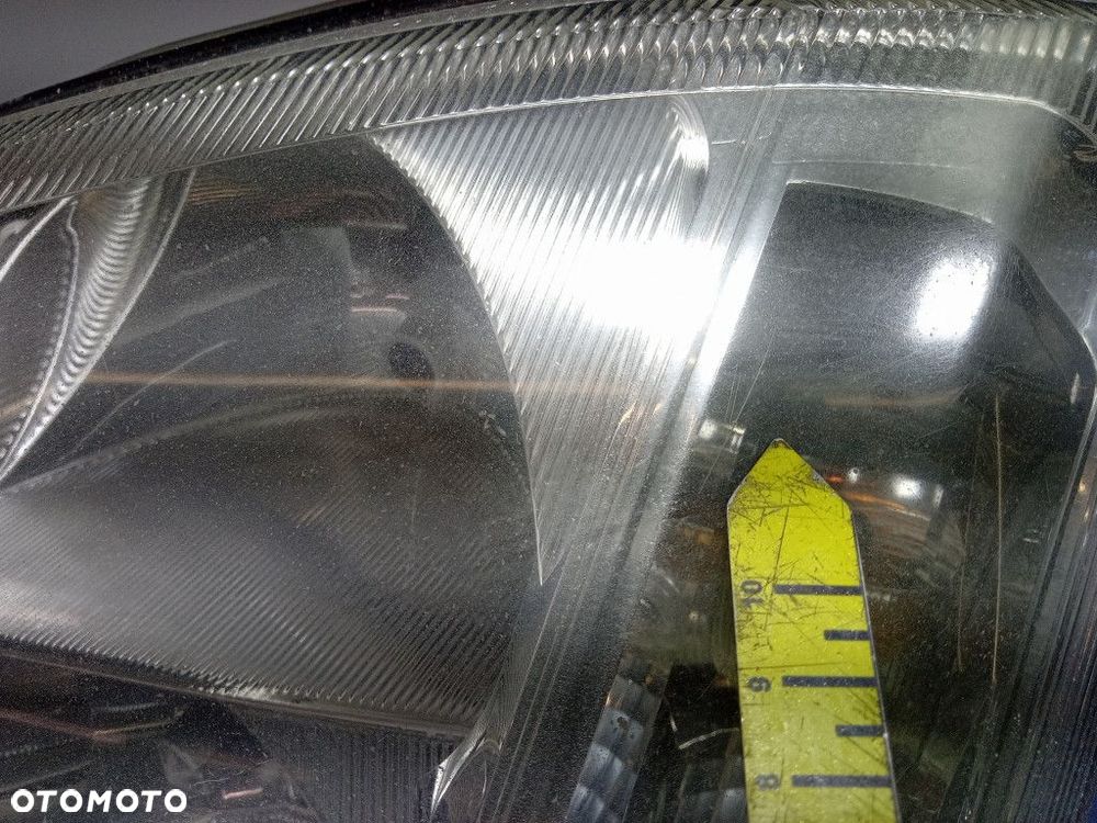 OPEL MERIVA A REFLEKTOR LEWY LAMPA EU 93321052 - 7