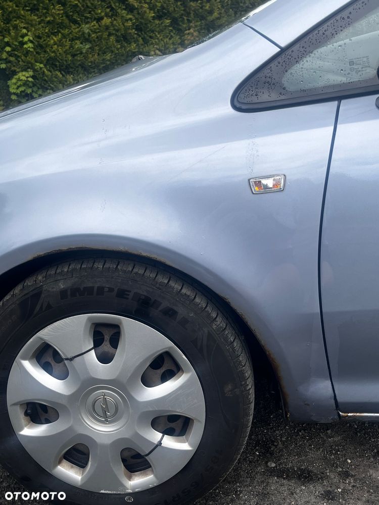 Opel Corsa 1.2 16V Cosmo - 12