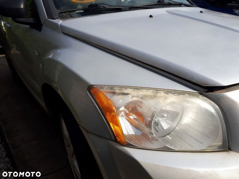 DODGE CALIBER 06-09 2.0 CRD OSŁONA PRZECIWSŁONECZNA PRAWA LEWA DASZEK SŁONECZNIK - 23