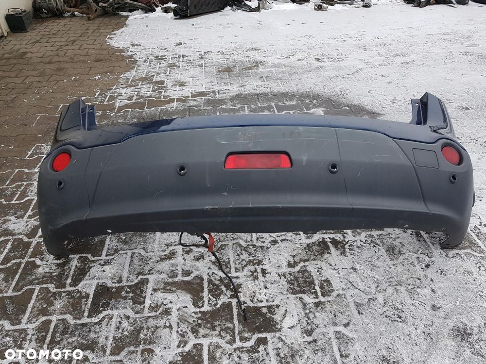 NISSAN QASHQAI I J10 +2 06-09r ZDERZAK TYŁ BW9G - 2