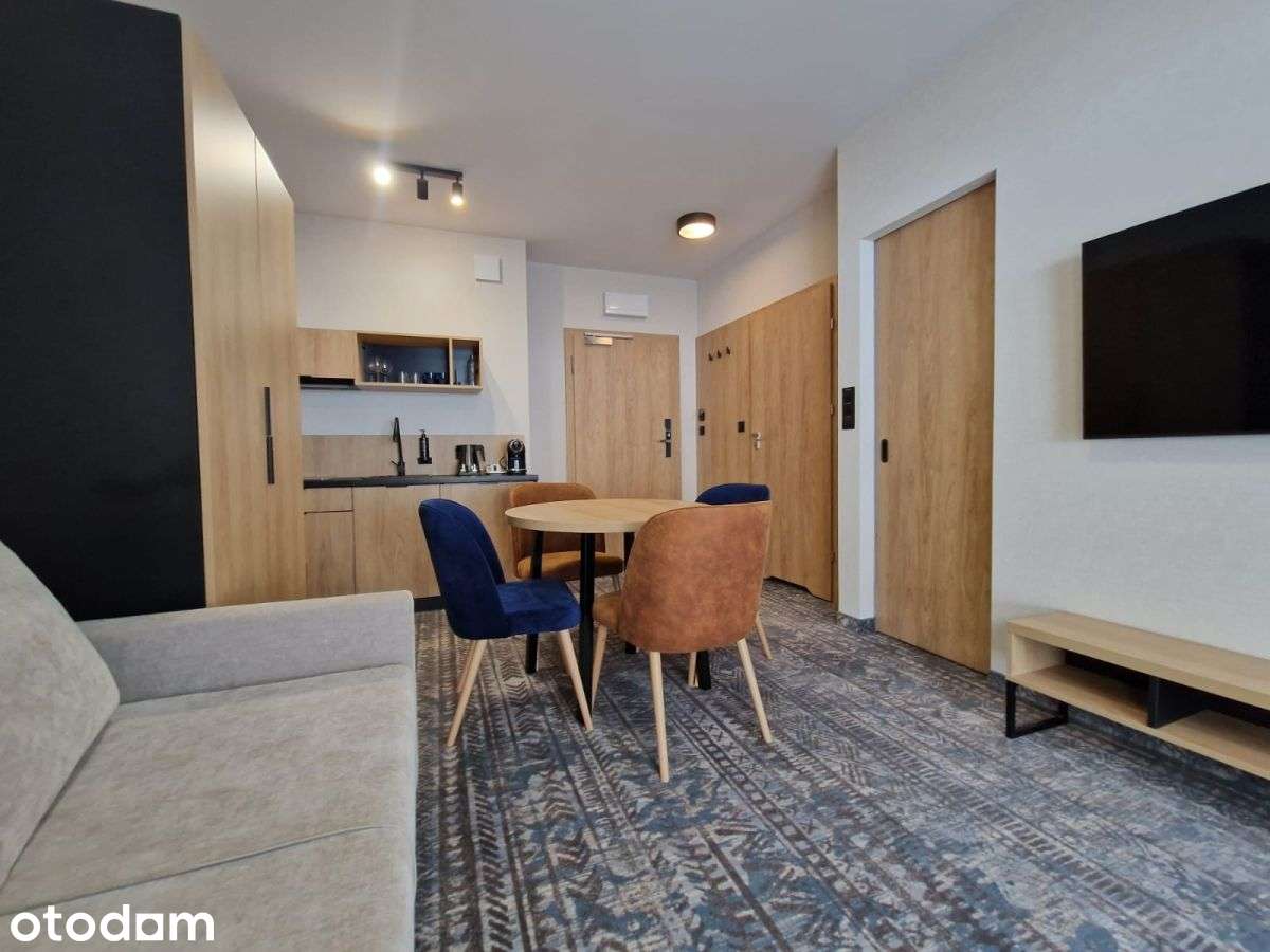 Apartament z miejscem w garażu i balkonem