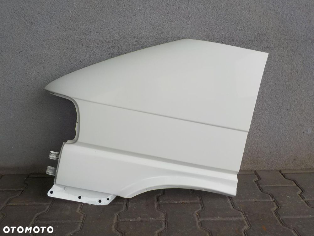 VW T4 CARAVELLE LIFT BŁOTNIK LEWY PRZÓD - 1